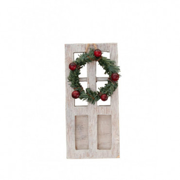 Porte blanche et couronne de noël